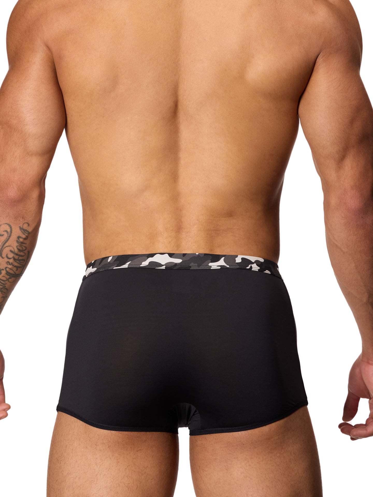 Rear view of a male model wearing black Body Aware trunks with a camouflage waistband