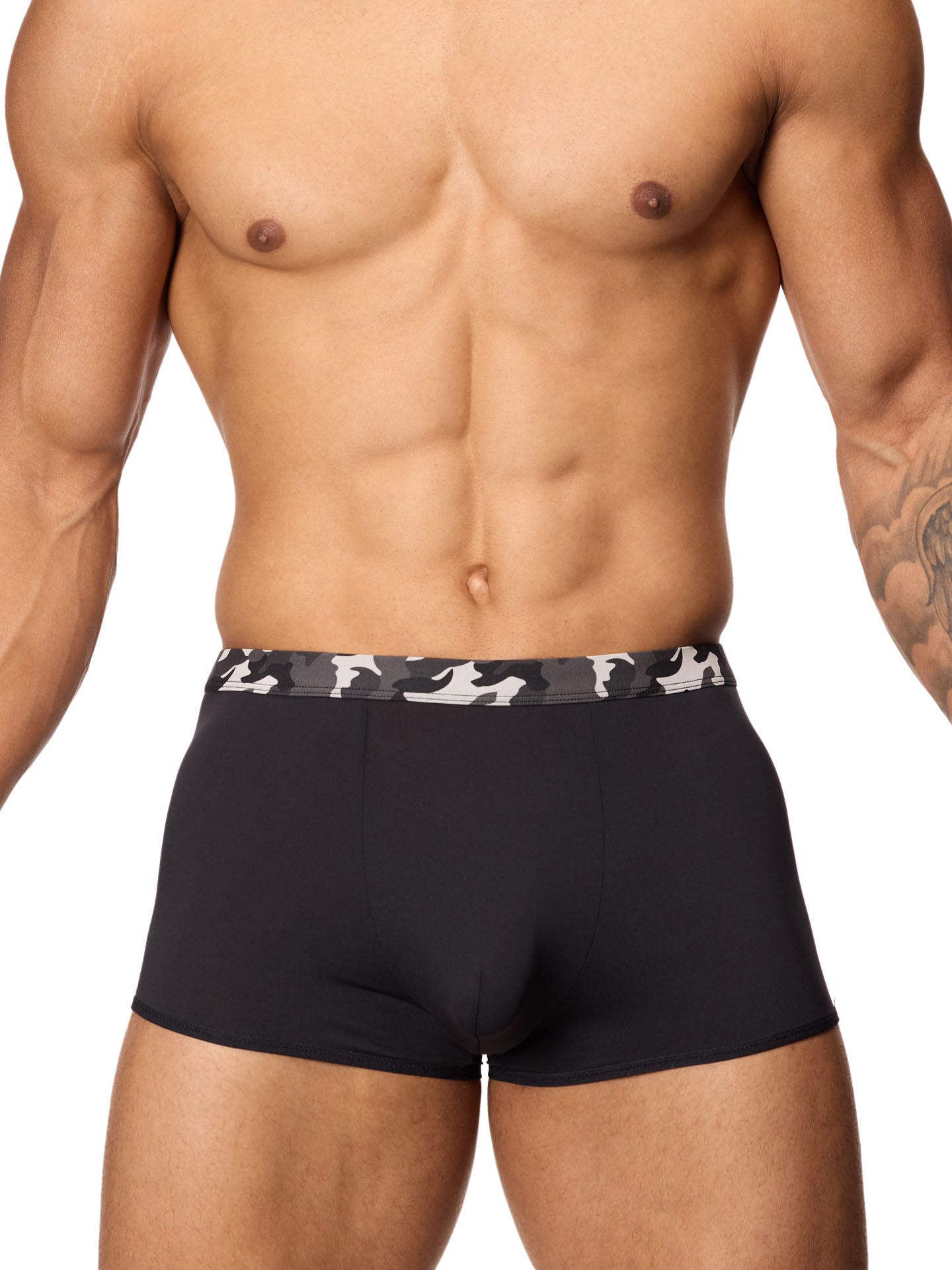 Front view of a male model wearing black Body Aware trunks with a camouflage waistband