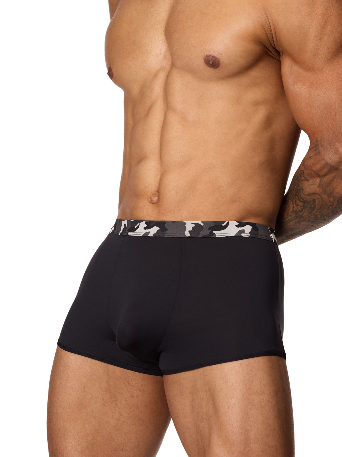 Front side view of a male model wearing black Body Aware trunks with a camouflage waistband