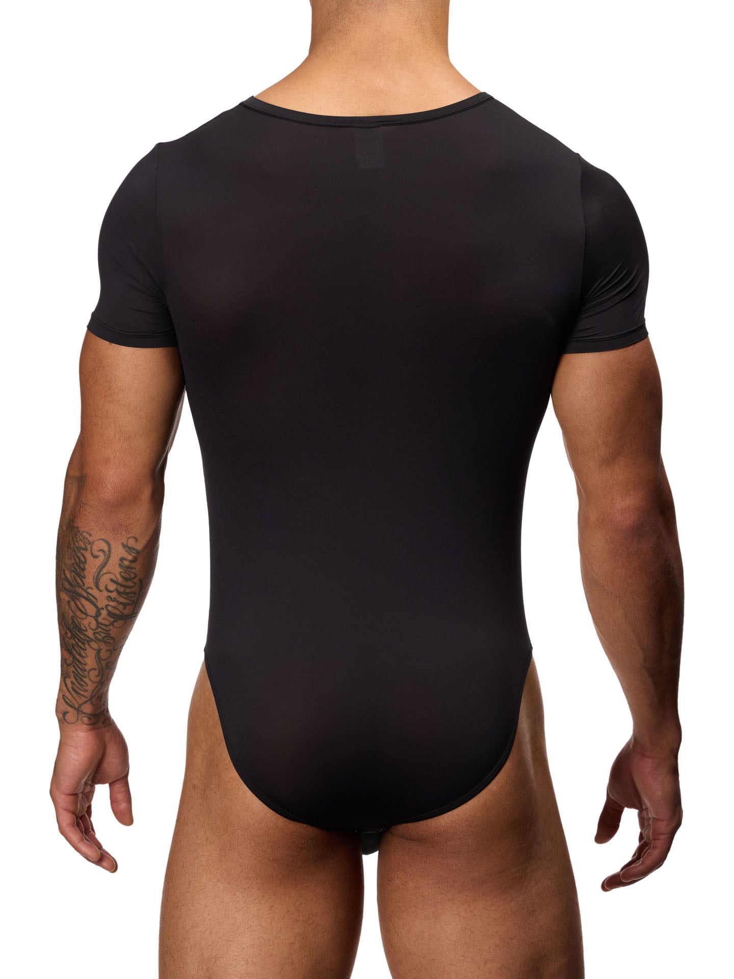 Rear view of a male model wearing a black Body Aware bodysuit with short-sleeves