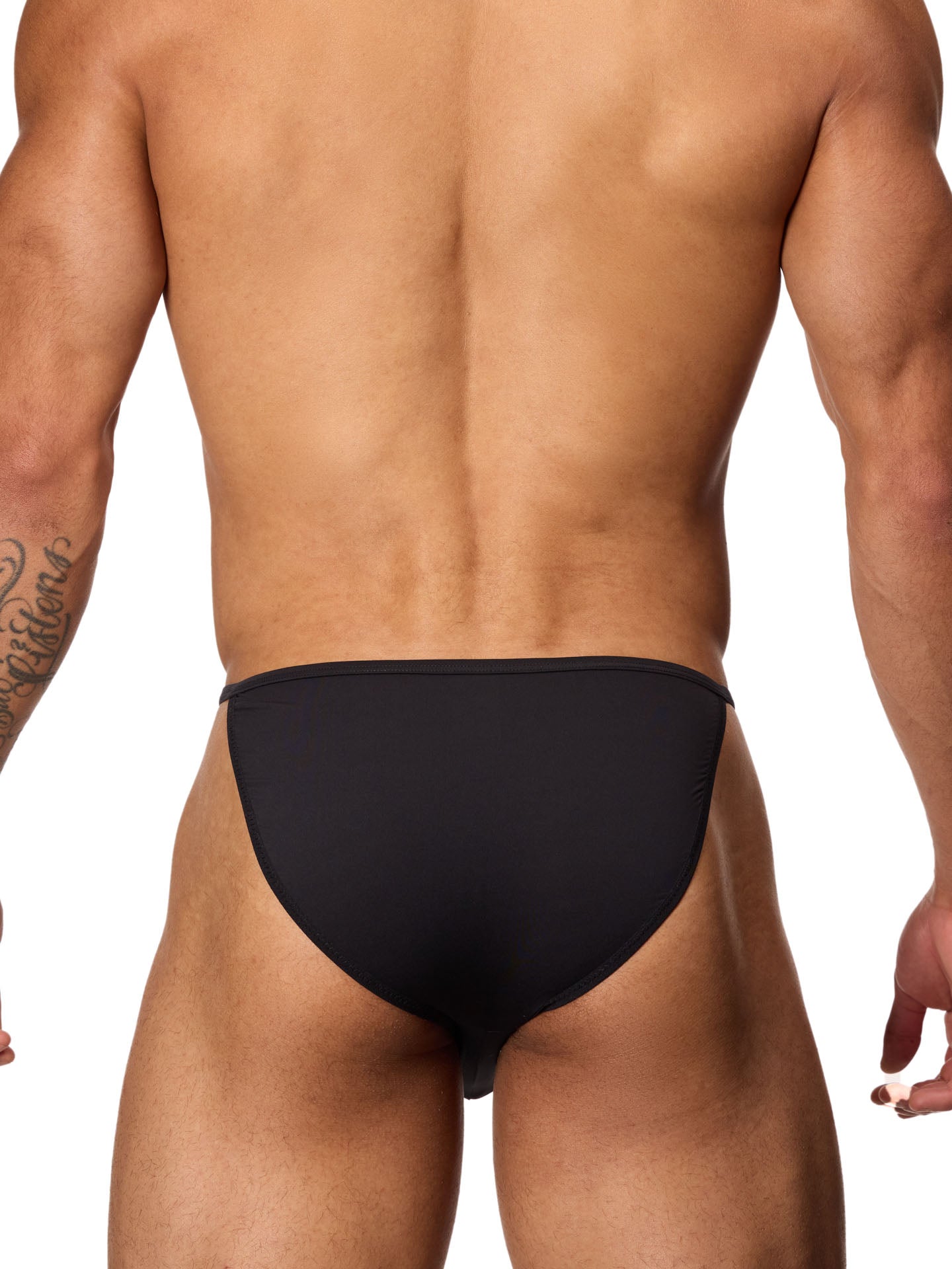 Rear view of a male model wearing a black Body Aware bikini brief