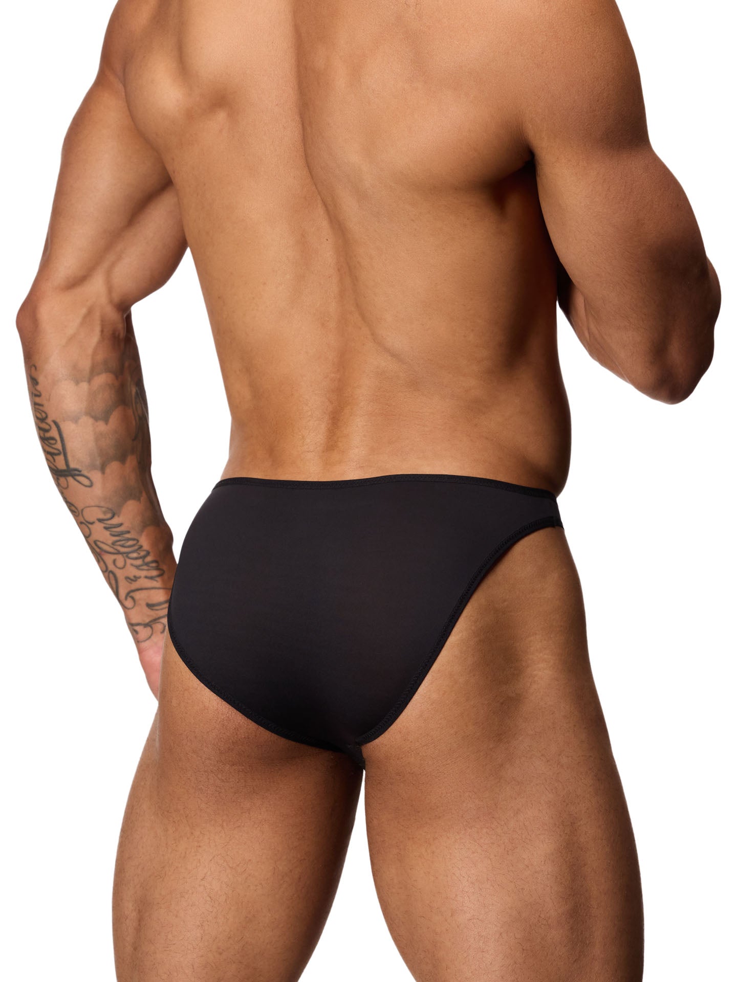 Back view of a male model wearing a black Body Aware brief