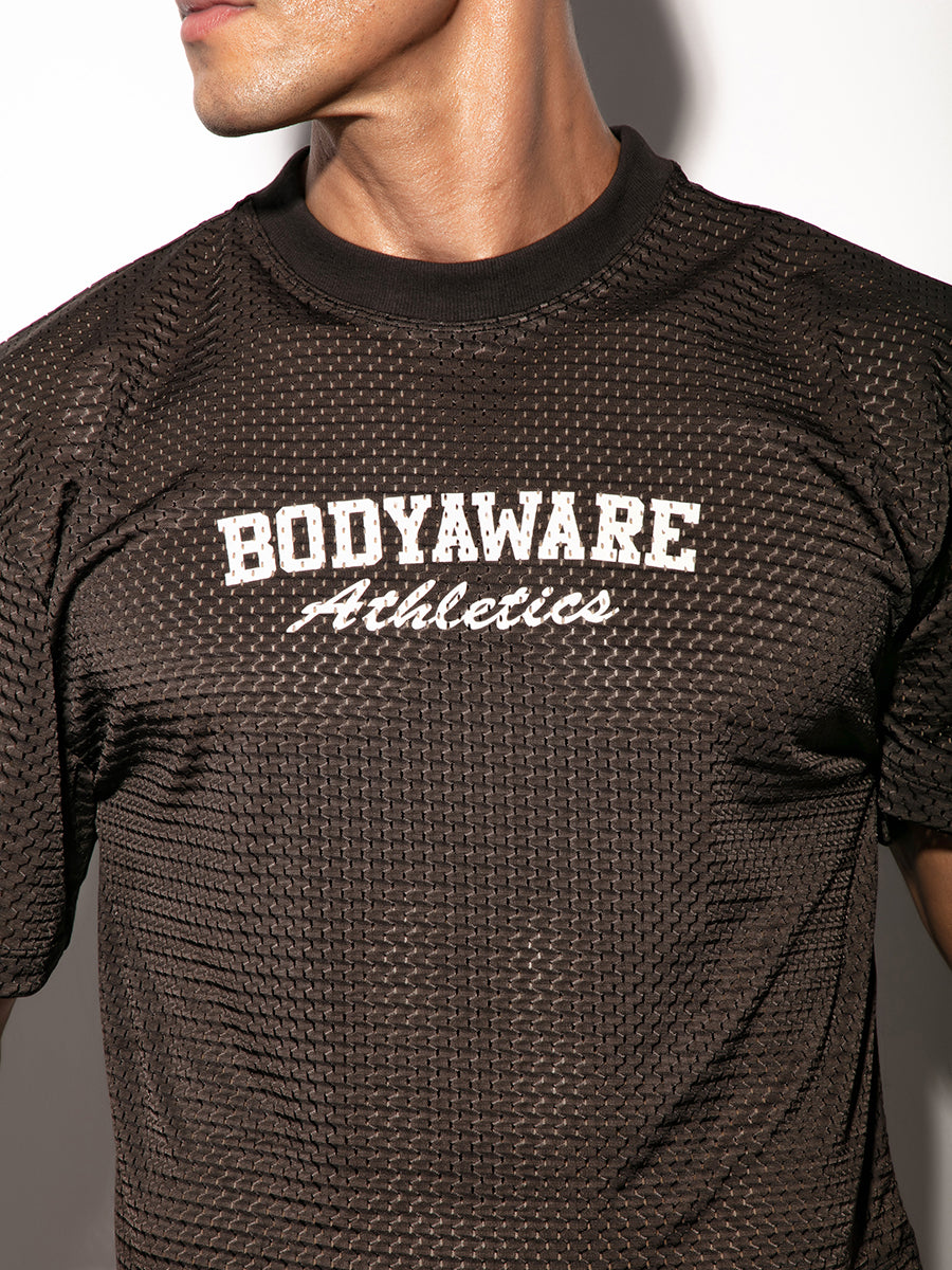 Black mesh jersey with 'Body Aware Athletics' written across the chest.