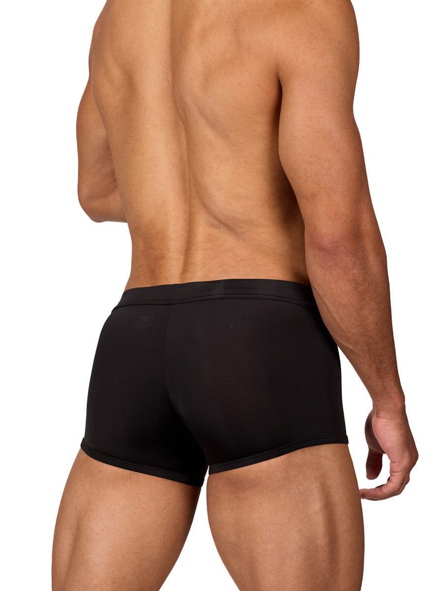 Rear view of a muscular male model wearing black Body Aware boxer shorts