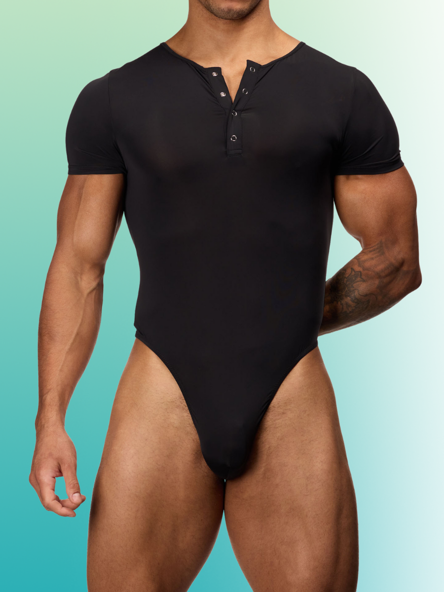 Front view of a male model wearing a black Body Aware bodysuit with a henley style neck