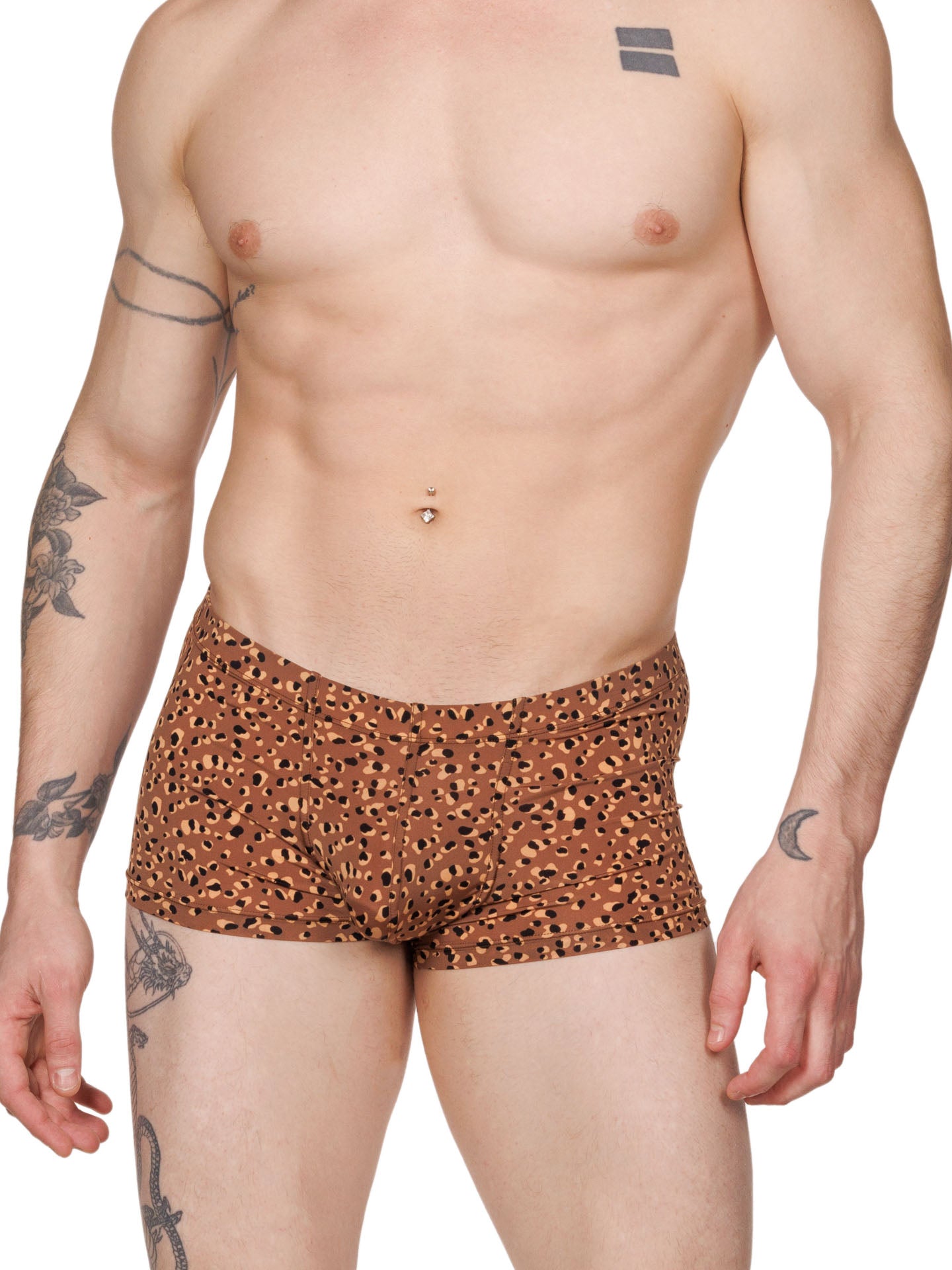 Front view of a male model wearing brown Body Aware boxer shorts with a leopard spot pattern