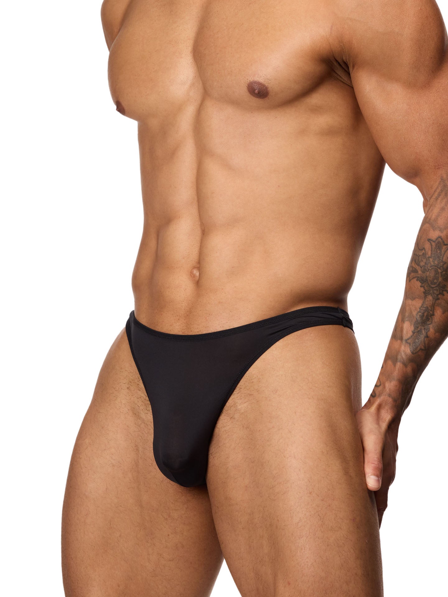 Front side view of a male model wearing a black Body Aware thong