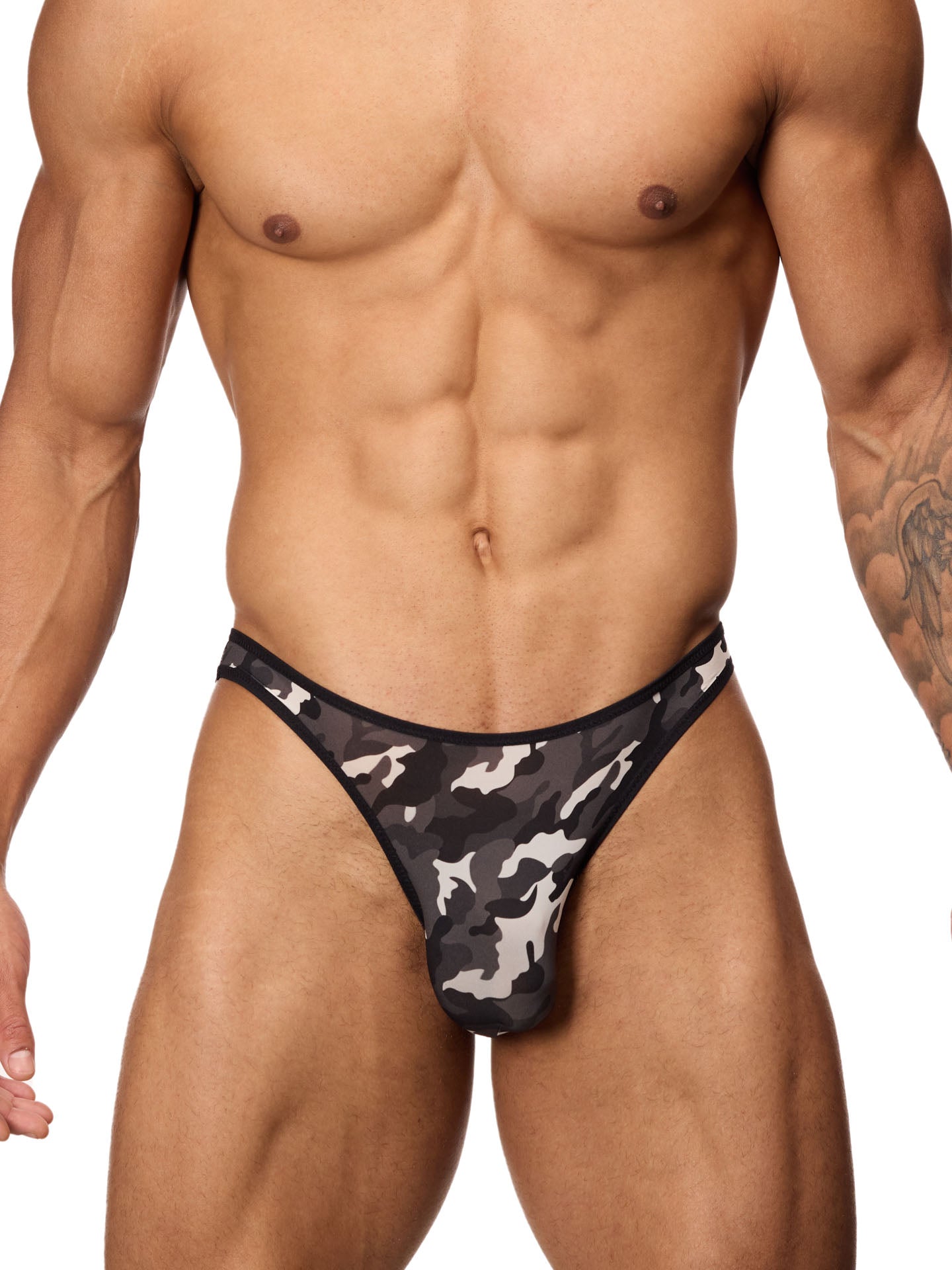 Front view of a male model wearing a black and white camouflage brief with black binding