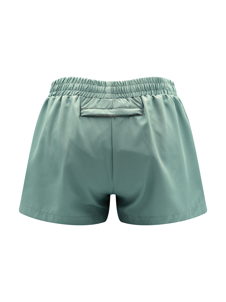 Green shorts on a white background