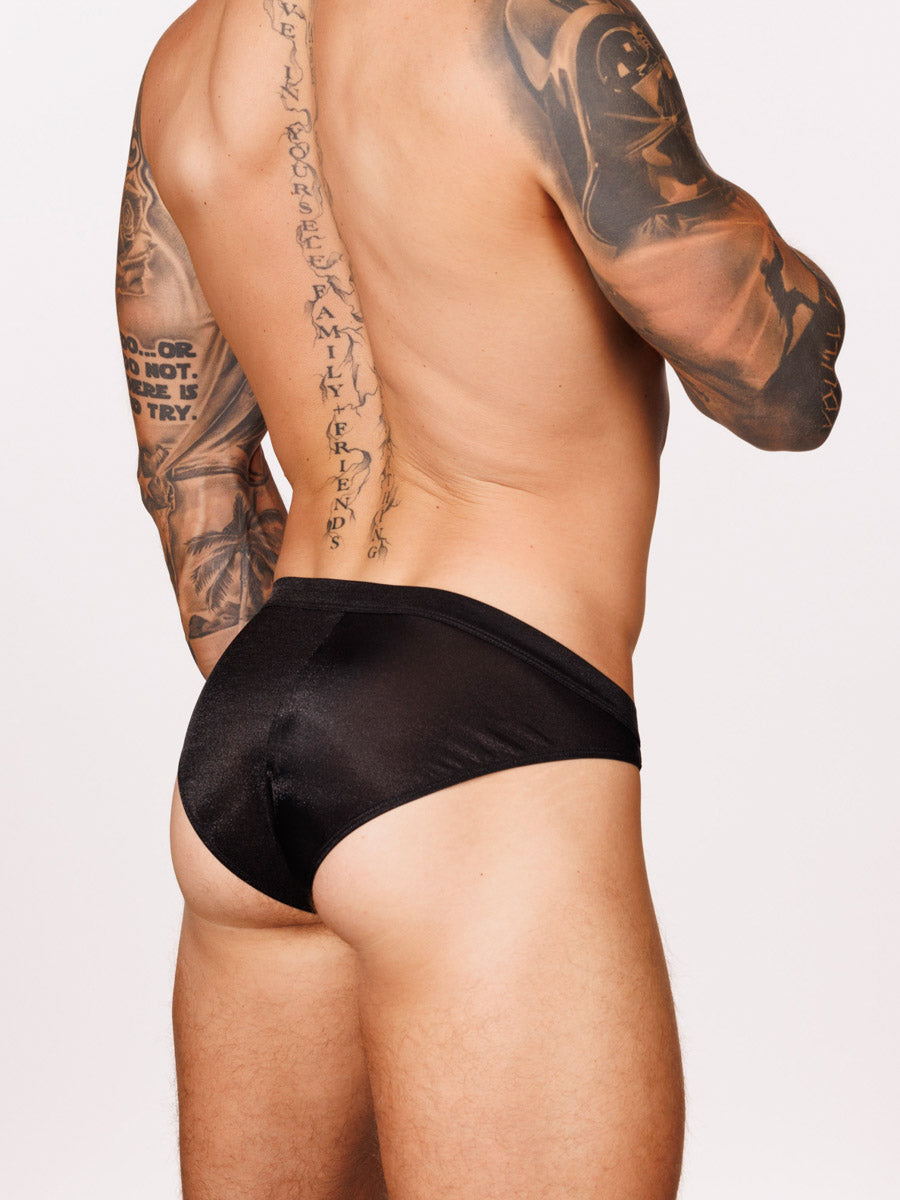 Back view of a male model wearing black Body Aware briefs