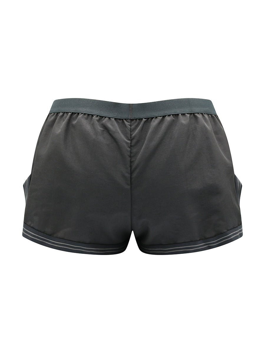 Black athletic shorts on a white background