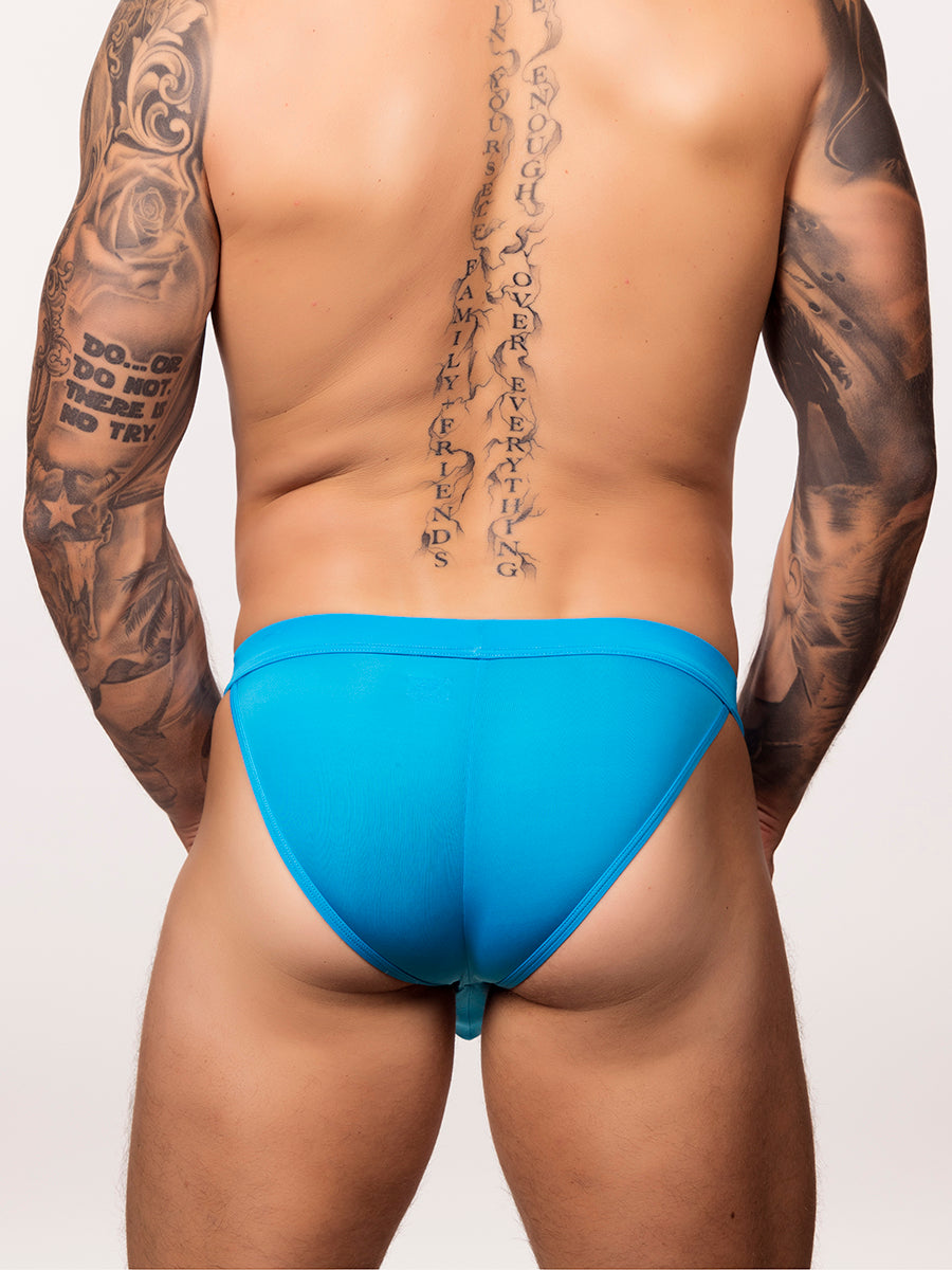 Back view of a man wearing a bright blue Body Aware glow sport tanga