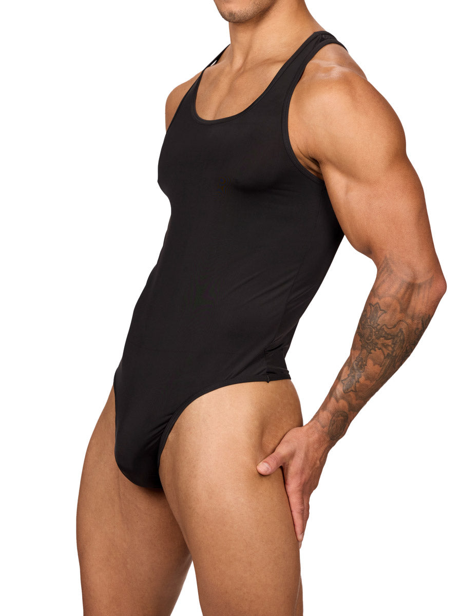 Side view of a muscular male model wearing a black Body Aware thong bodysuit