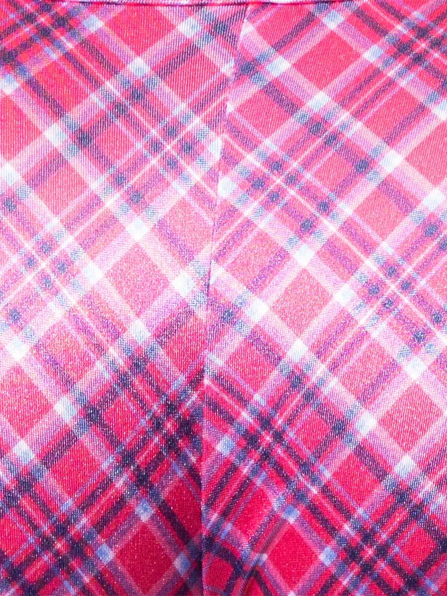 Closeup view of pink fabric with a plaid pattern