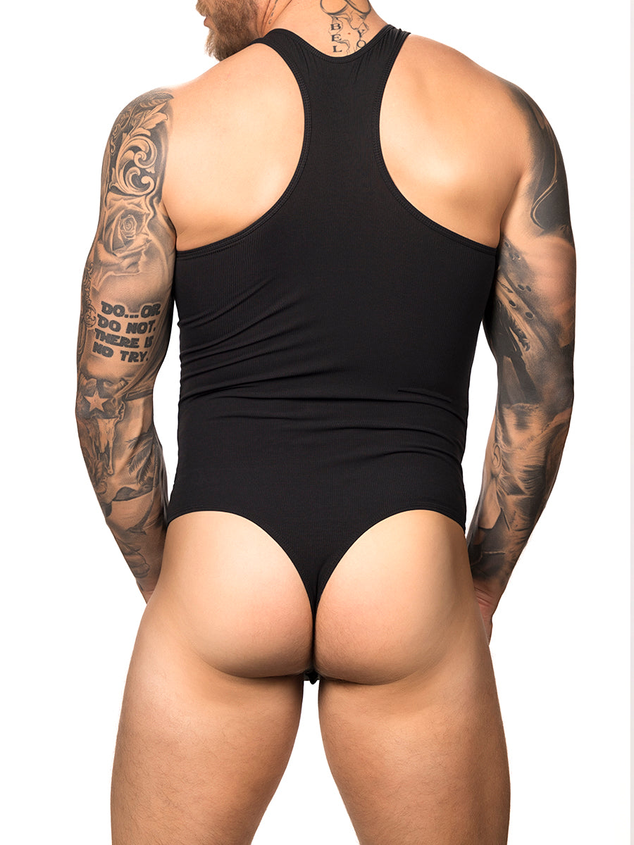 Back view of a male model wearing a black Body Aware tank style bodysuit with thong back