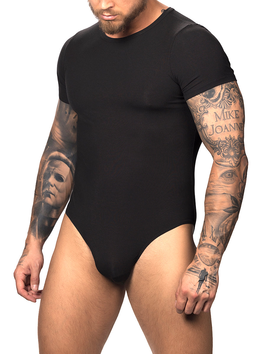 Front view of a male model wearing a black Body Aware t-shirt style bodysuit with brief back