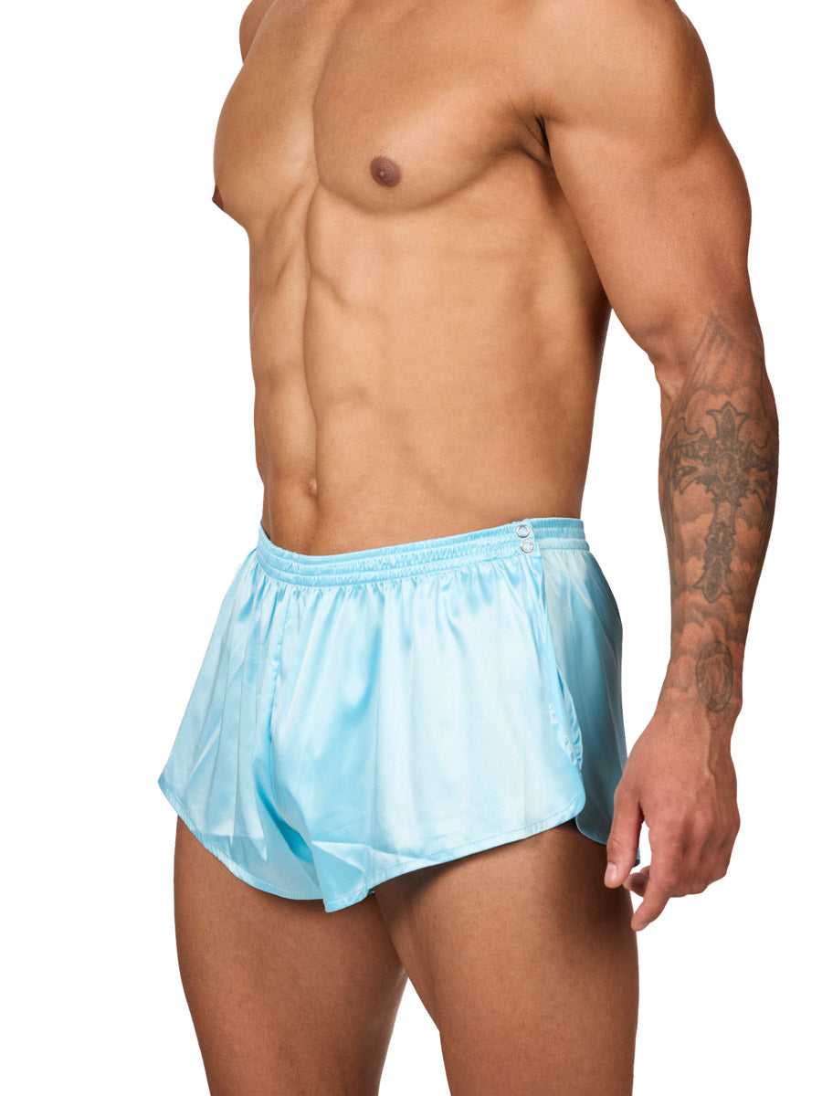 Side view of a male model wearing Body Aware sky blue men's tear away shorts