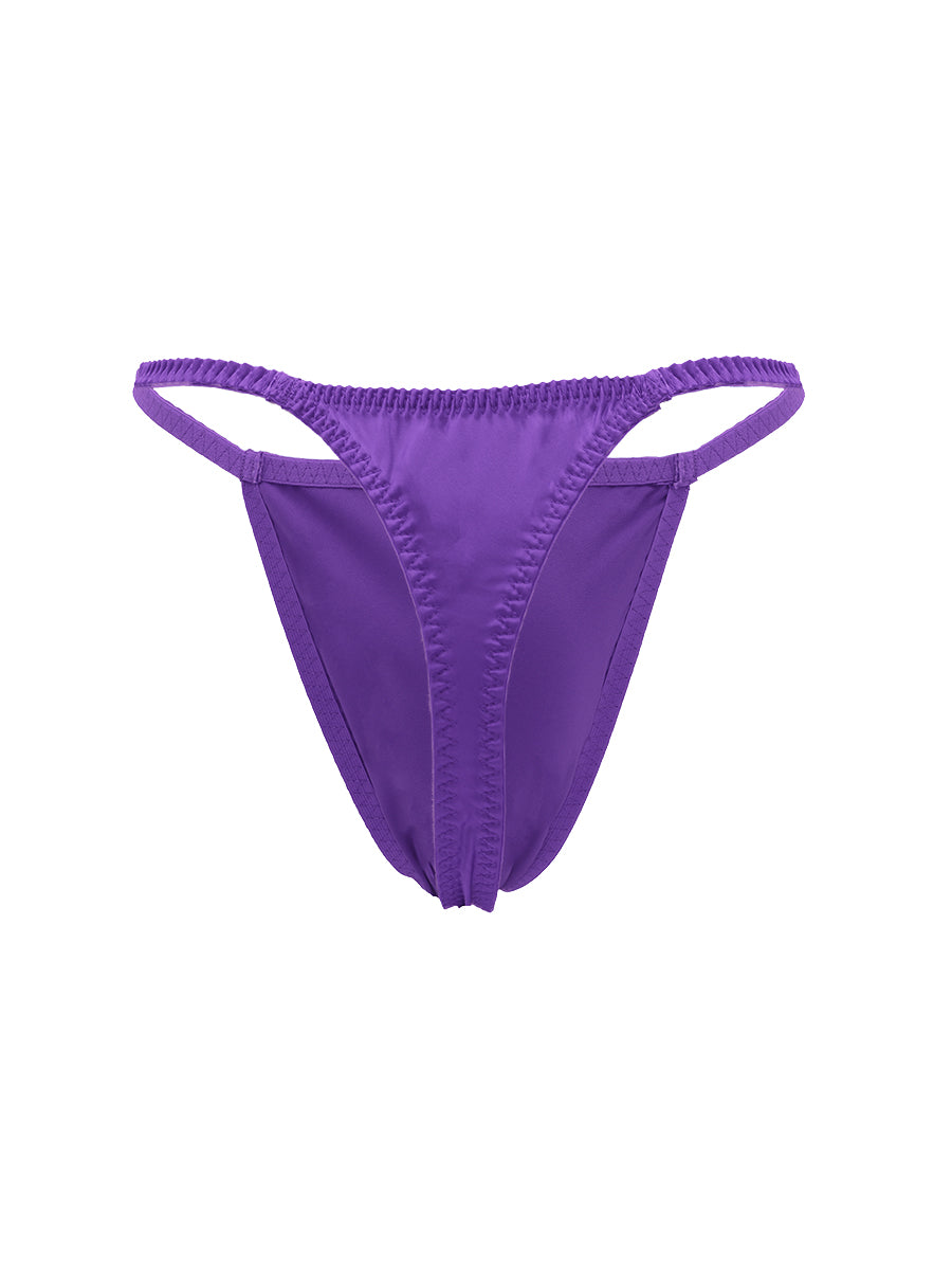 Bright purple men's satin thong on a white background.