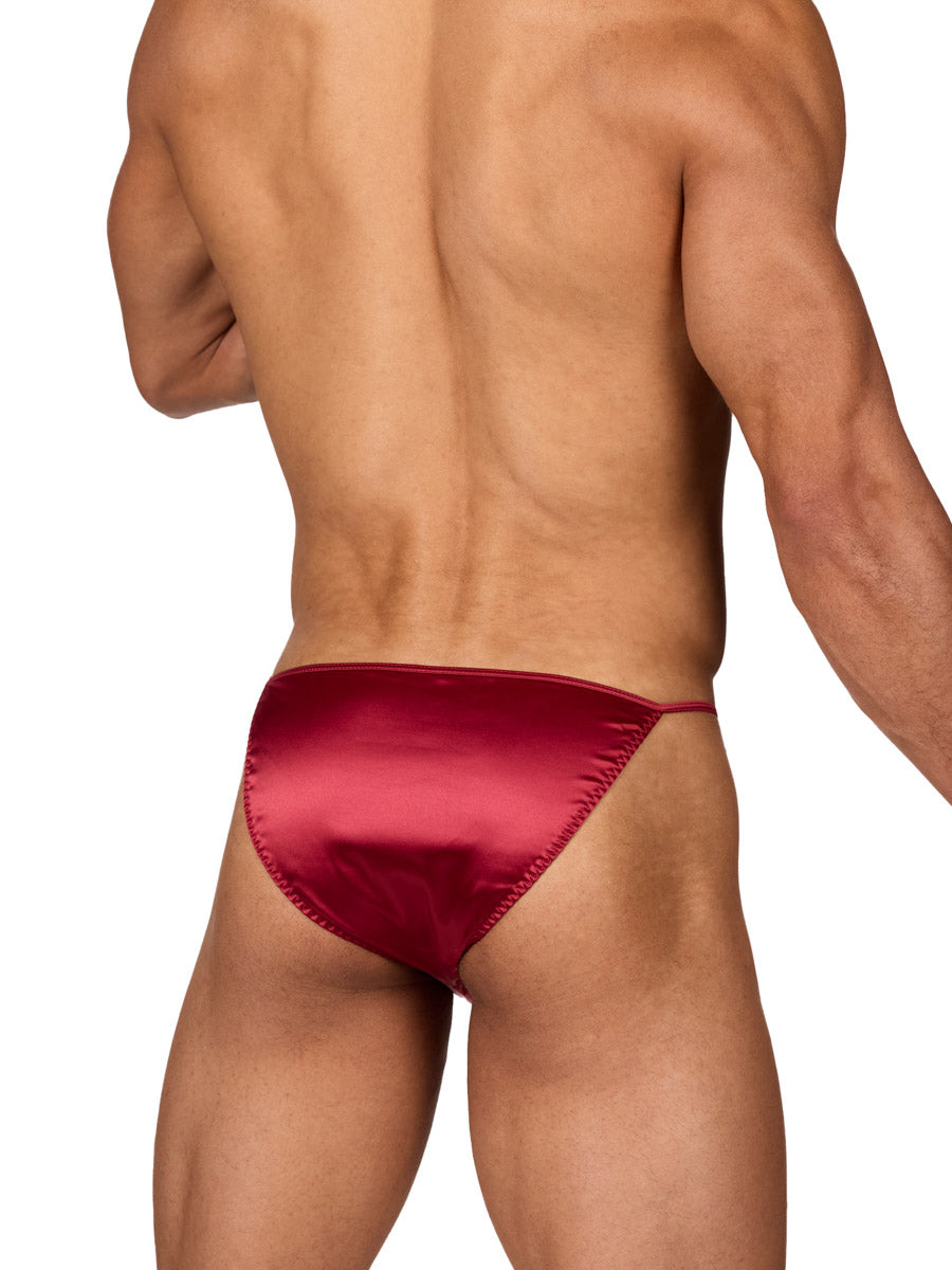 Back view of a male model wearing a Body Aware red men's bikini brief